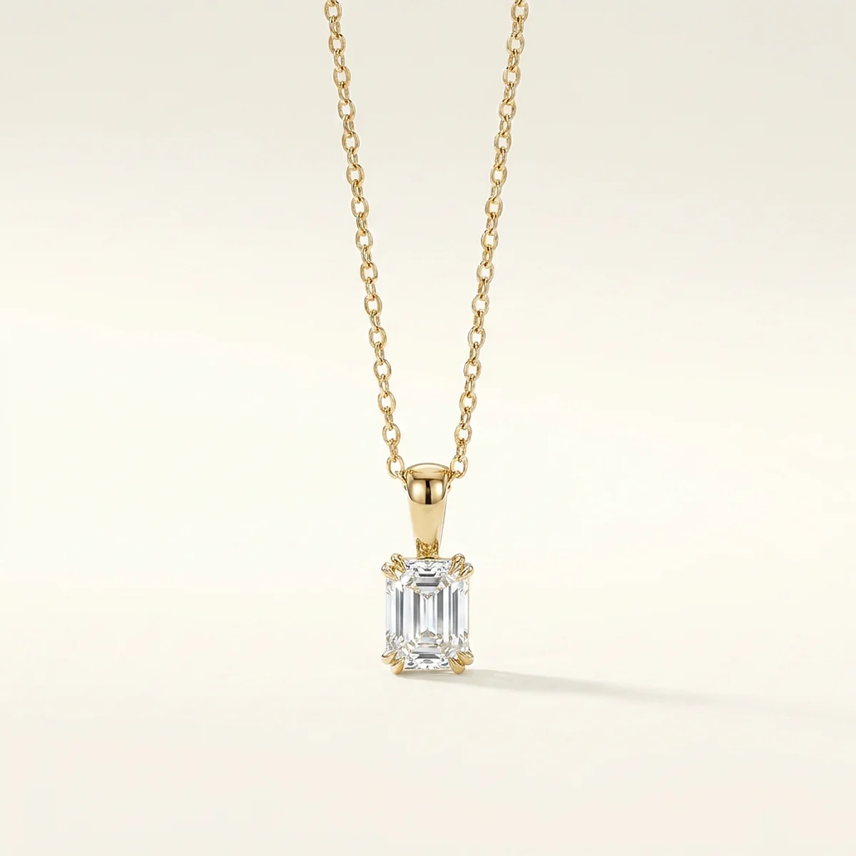 A .4ct colorless emerald diamond on a yellow gold pendant, custom-designed by Eterneva to honor the remarkable Rosie.