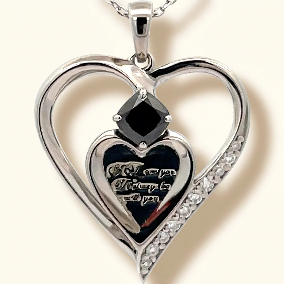 A .25ct black cushion diamond on a white gold pendant, custom-designed by Eterneva to honor the remarkable Donald.