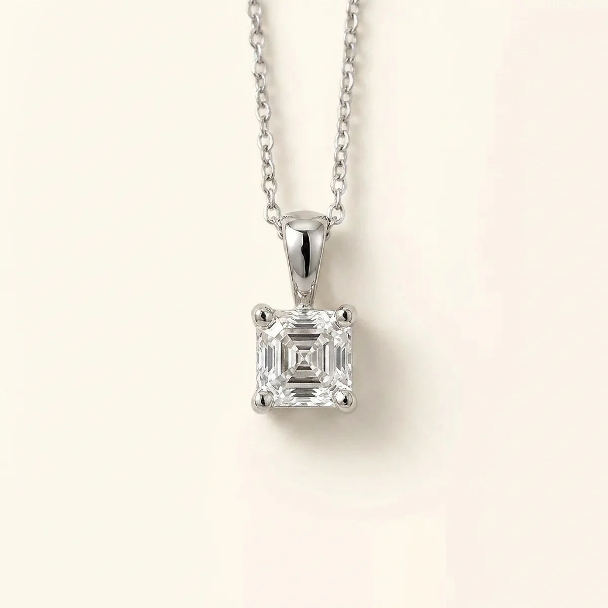 A .5ct colorless asscher diamond on a white gold pendant, custom-designed by Eterneva to honor the remarkable John.