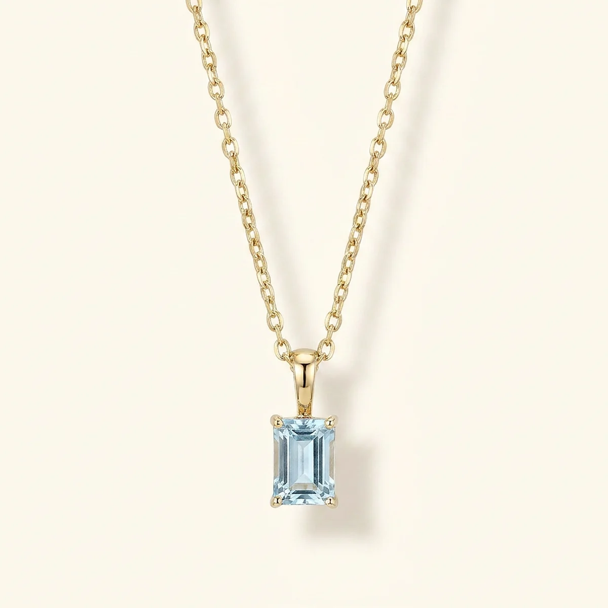 A .4ct blue rectangular radiant diamond on a yellow gold pendant, custom-designed by Eterneva to honor the remarkable Maximus.