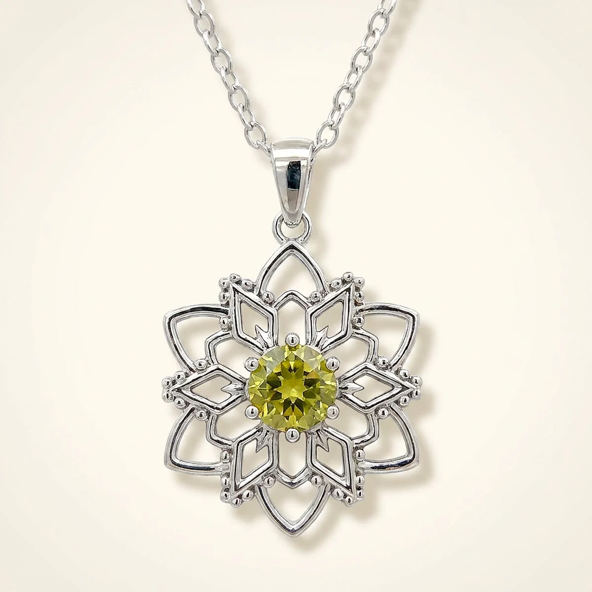 A .5ct green round diamond on a white gold pendant, custom-designed by Eterneva to honor the remarkable Yuki.