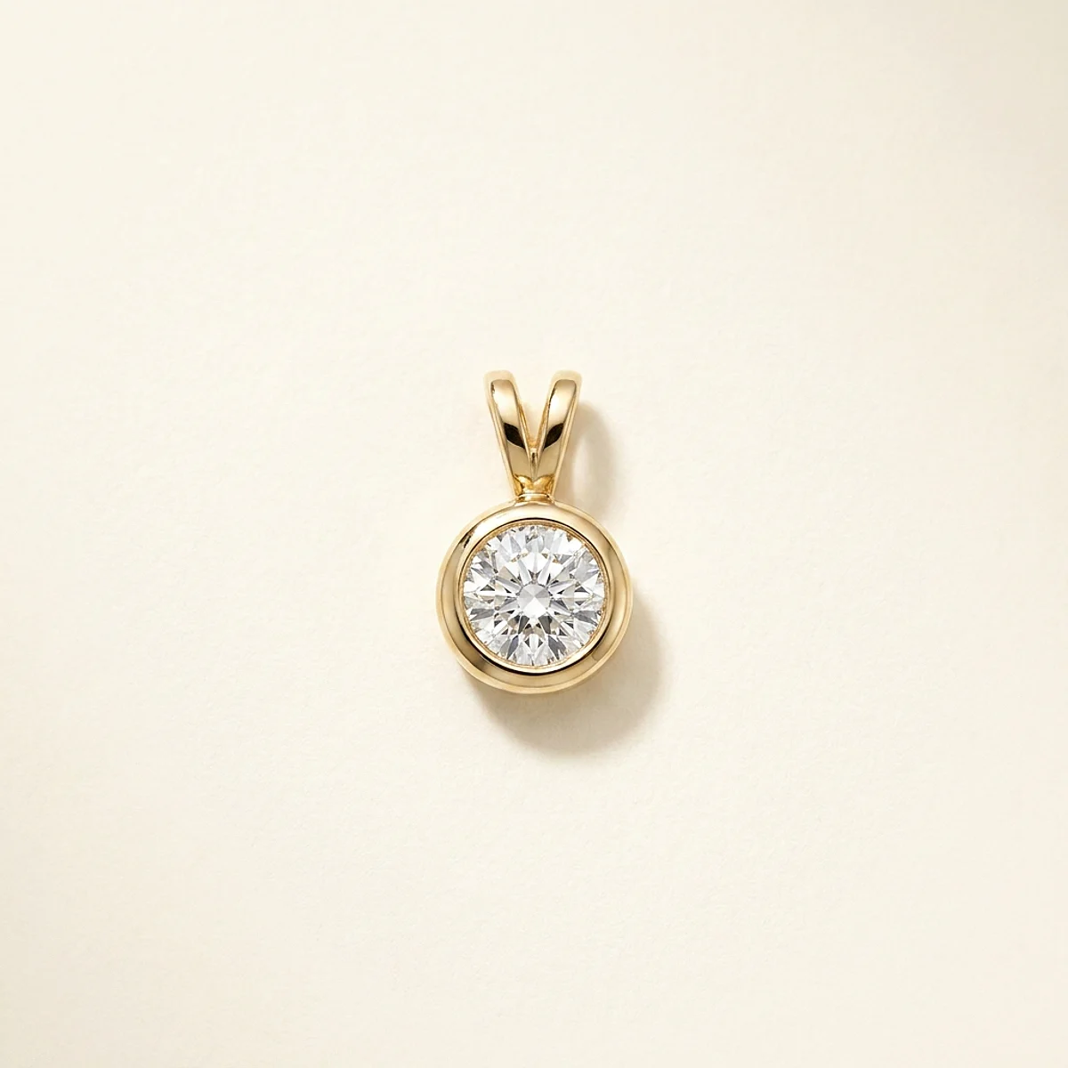 A .75ct colorless round diamond on a yellow gold pendant, custom-designed by Eterneva to honor the remarkable Aileen.