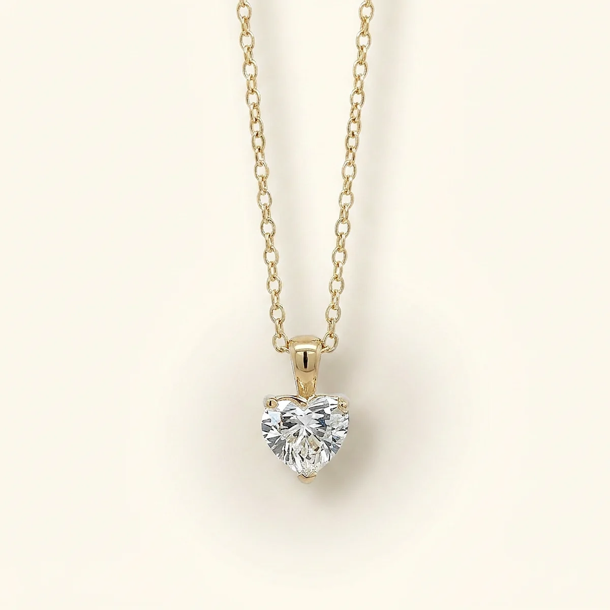A .5ct colorless heart diamond on a yellow gold pendant, custom-designed by Eterneva to honor the remarkable Herbert.