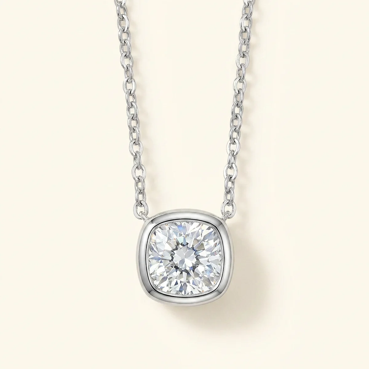 A .5ct colorless cushion diamond on a white gold pendant, custom-designed by Eterneva to honor the remarkable Tomi.