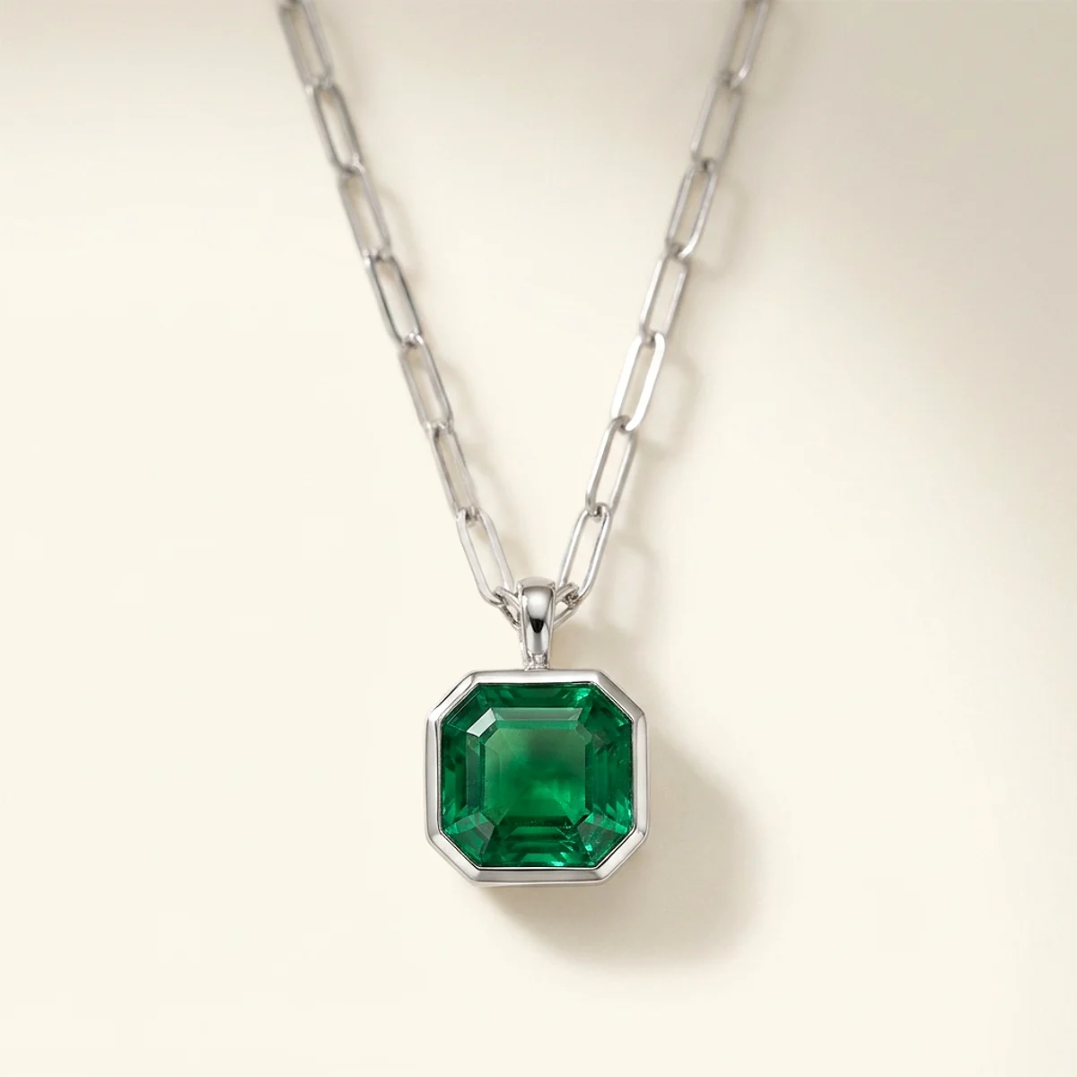 A .5ct green asscher diamond on a white gold necklace, custom-designed by Eterneva to honor the remarkable Jacob.