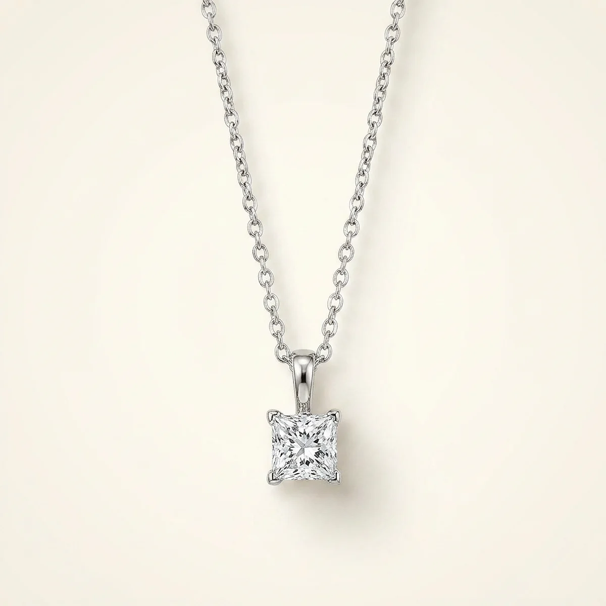 A .5ct colorless cushion diamond on a platinum necklace, custom-designed by Eterneva to honor the remarkable Megan.