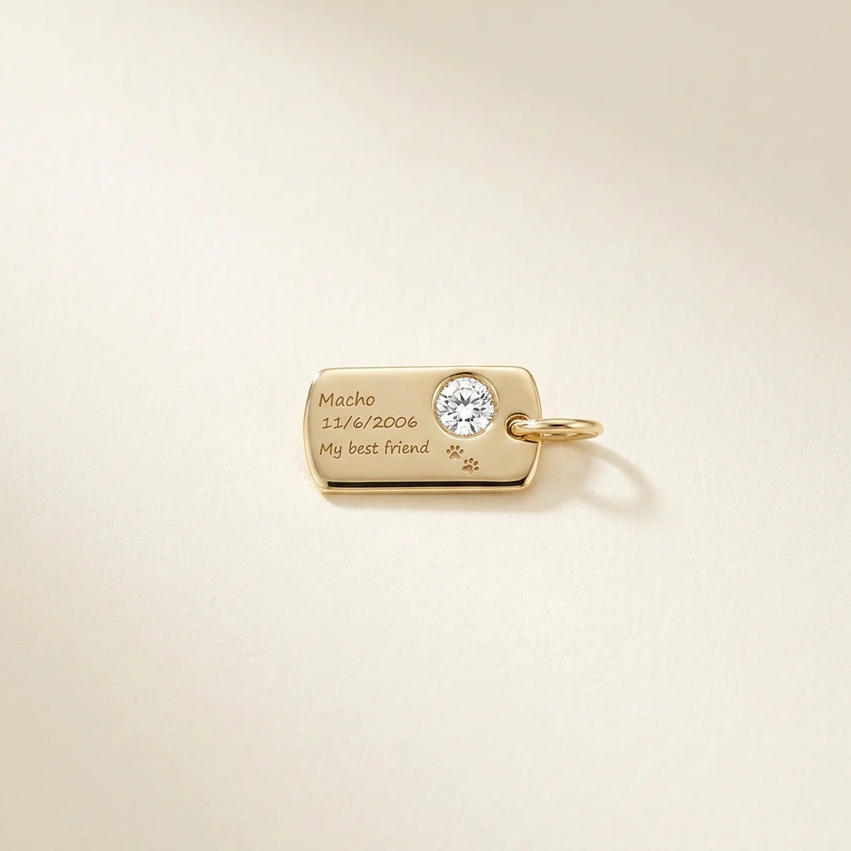 A .5ct colorless round diamond on a yellow gold pendant, custom-designed by Eterneva to honor the remarkable Macho.