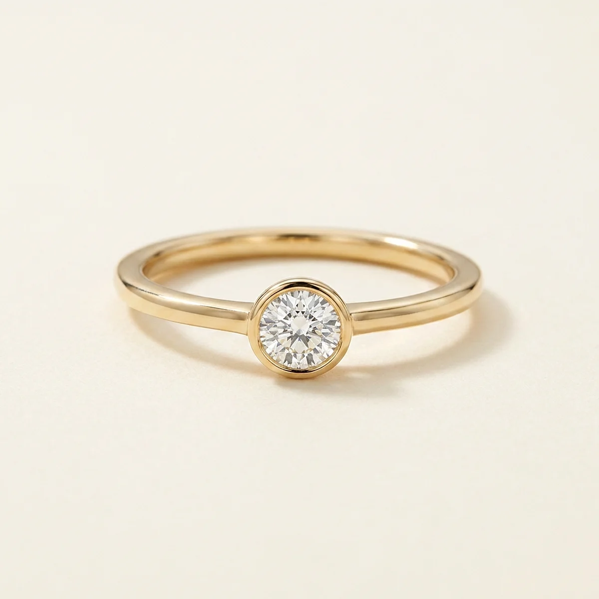 A .25ct colorless round diamond on a yellow gold ring, custom-designed by Eterneva to honor the remarkable Susan.