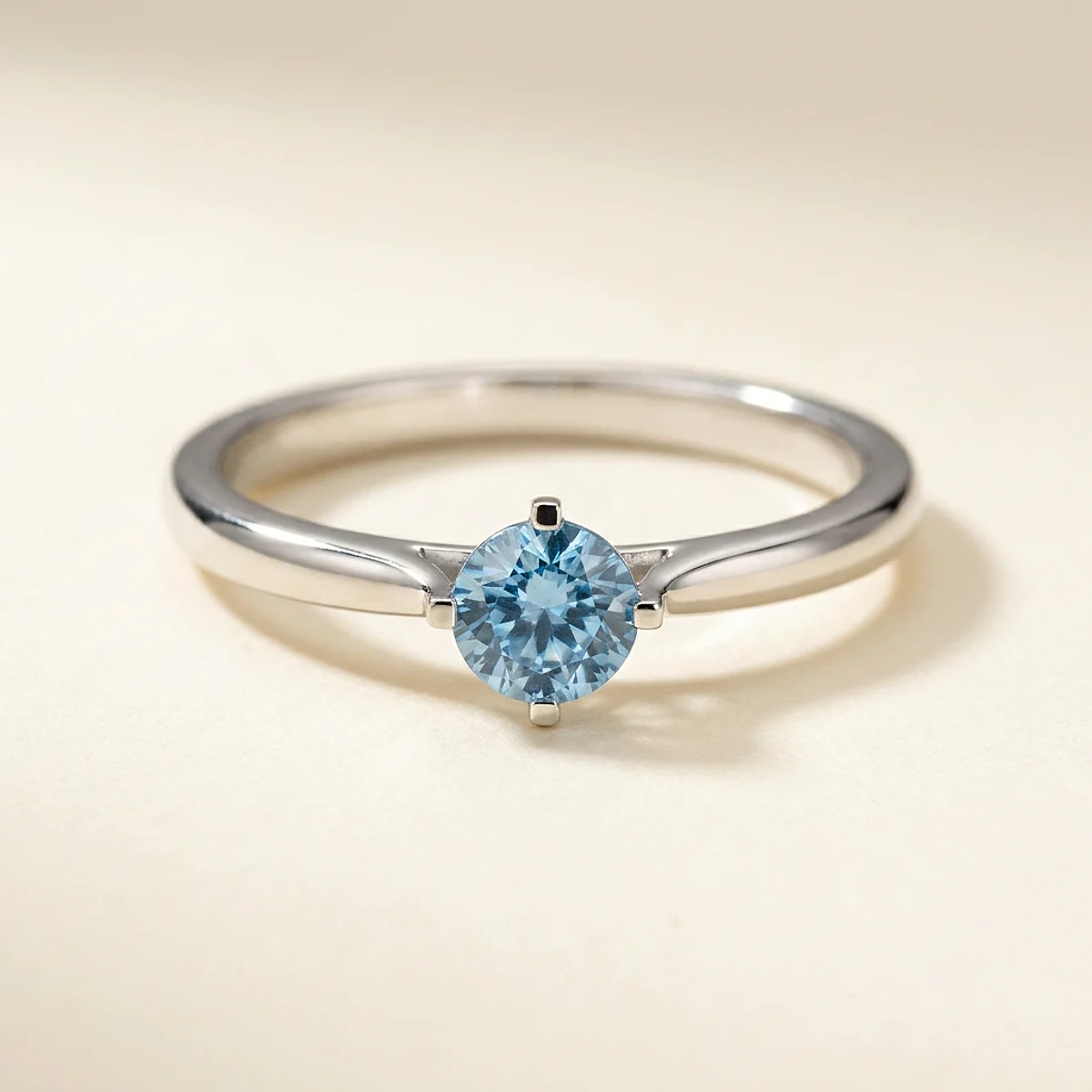 A .4ct blue round diamond on a white gold ring, custom-designed by Eterneva to honor the remarkable Jim.