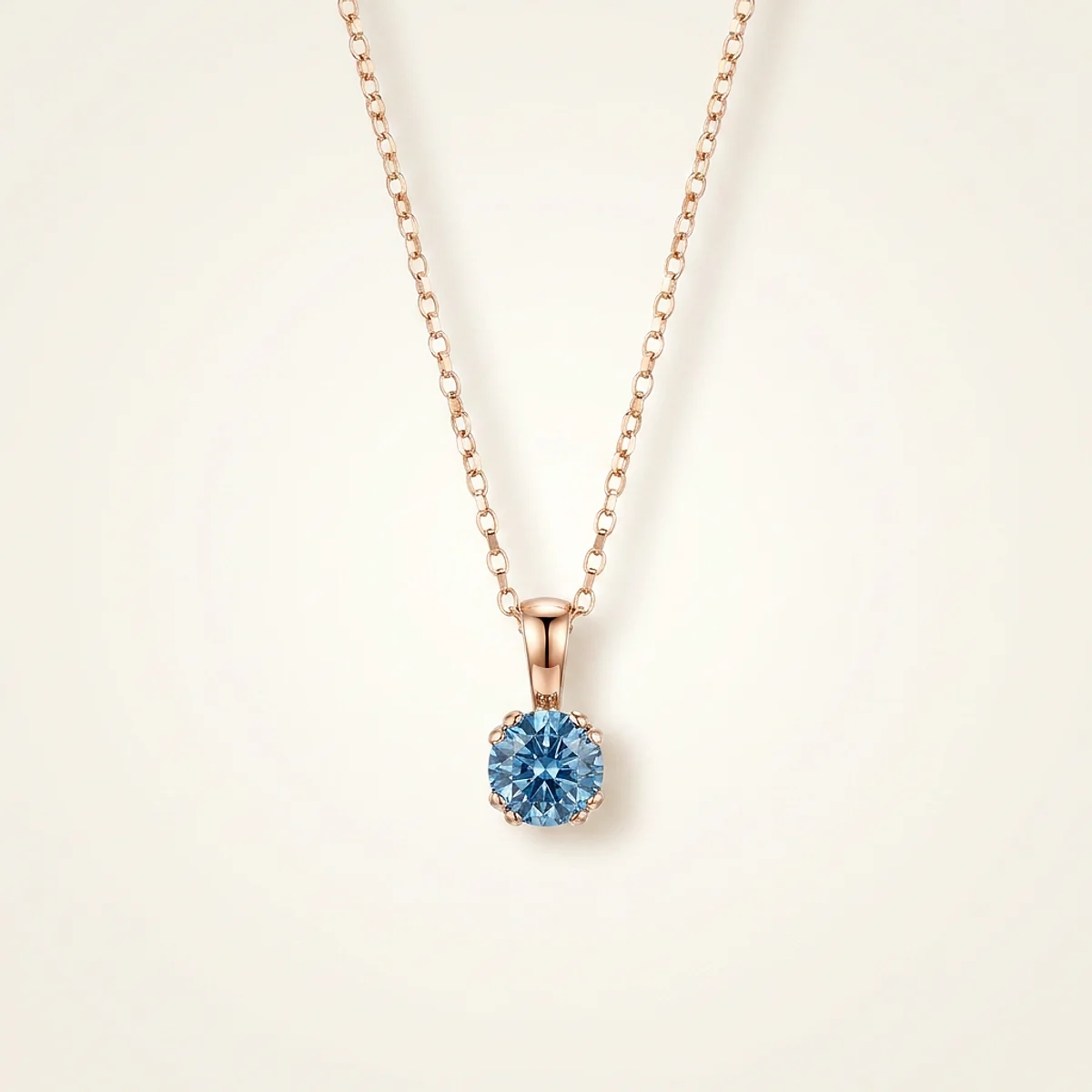 A .25ct blue round diamond on a yellow gold necklace, custom-designed by Eterneva to honor the remarkable Janice.