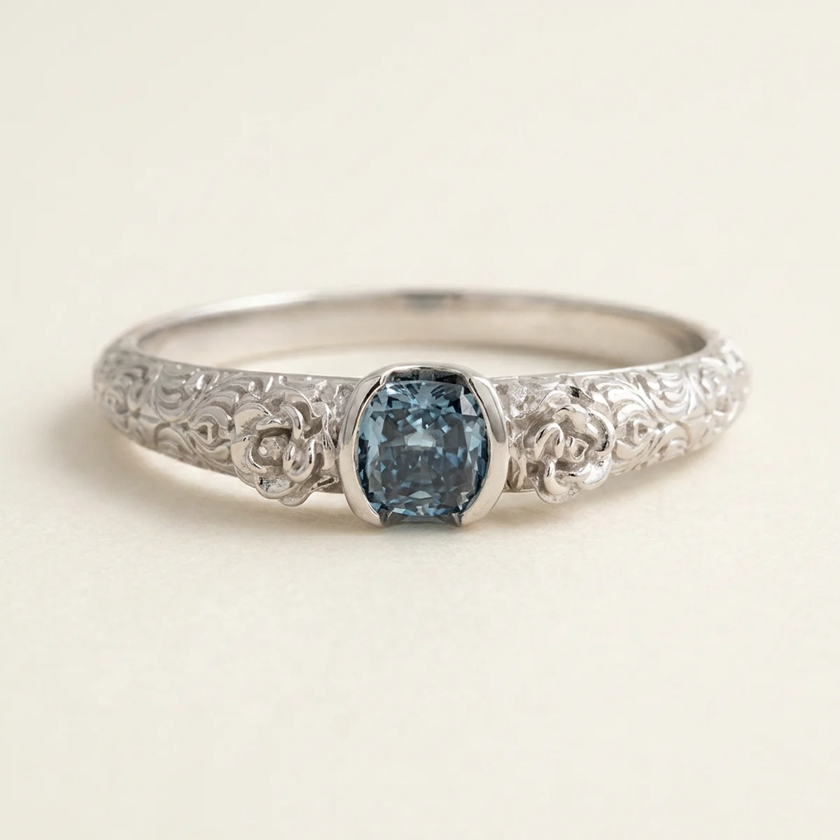 A .25ct blue cushion diamond on a white gold ring, custom-designed by Eterneva to honor the remarkable Brandon.