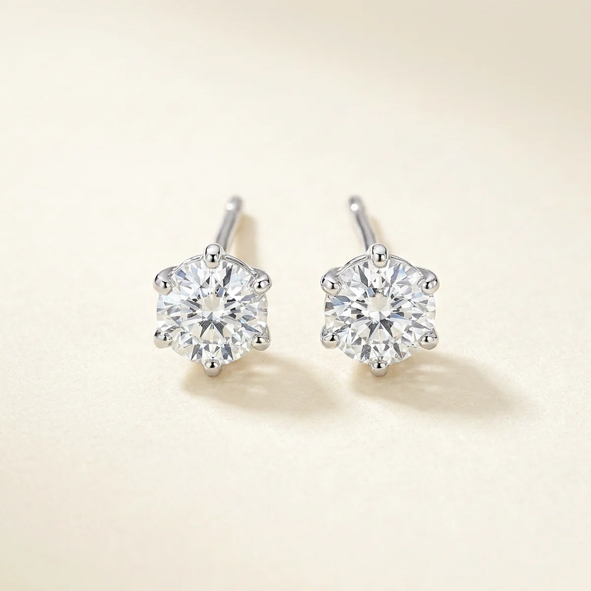 A .25ct colorless round diamond on white gold earrings, custom-designed by Eterneva to honor the remarkable Lyndell.