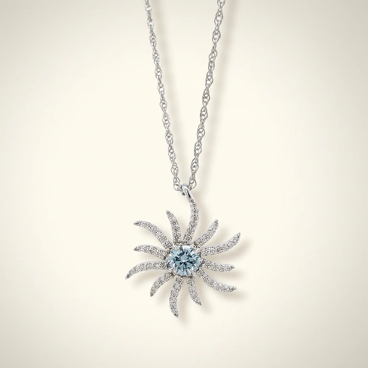A .5ct blue round diamond on a white gold necklace, custom-designed by Eterneva to honor the remarkable Robert.