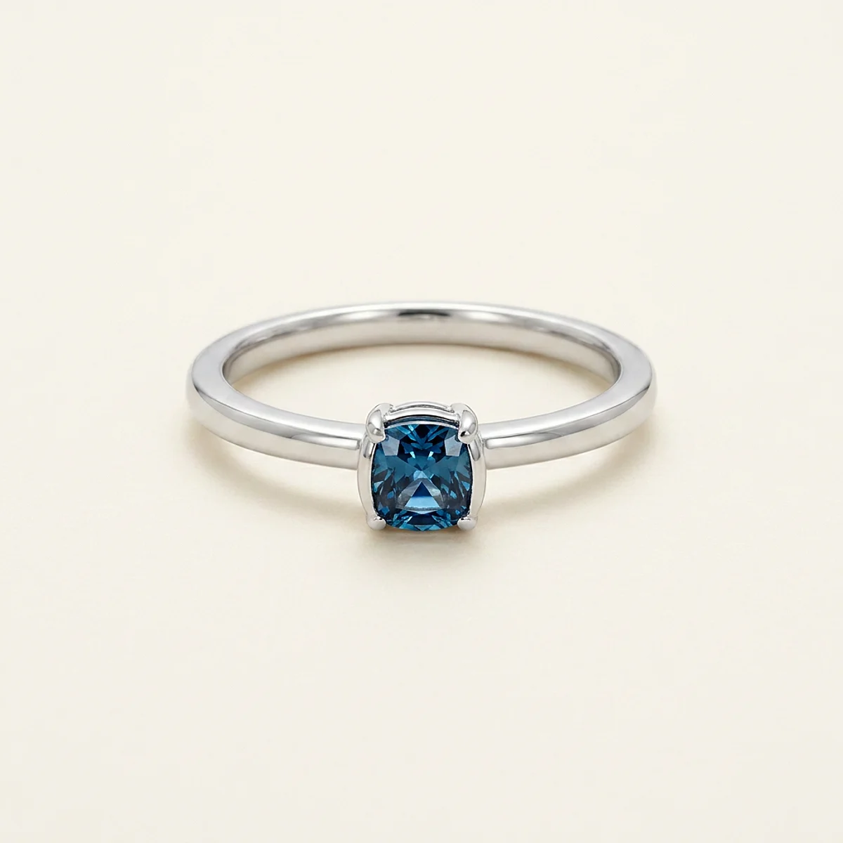 A .25ct blue cushion diamond on a white gold ring, custom-designed by Eterneva to honor the remarkable Thomas.