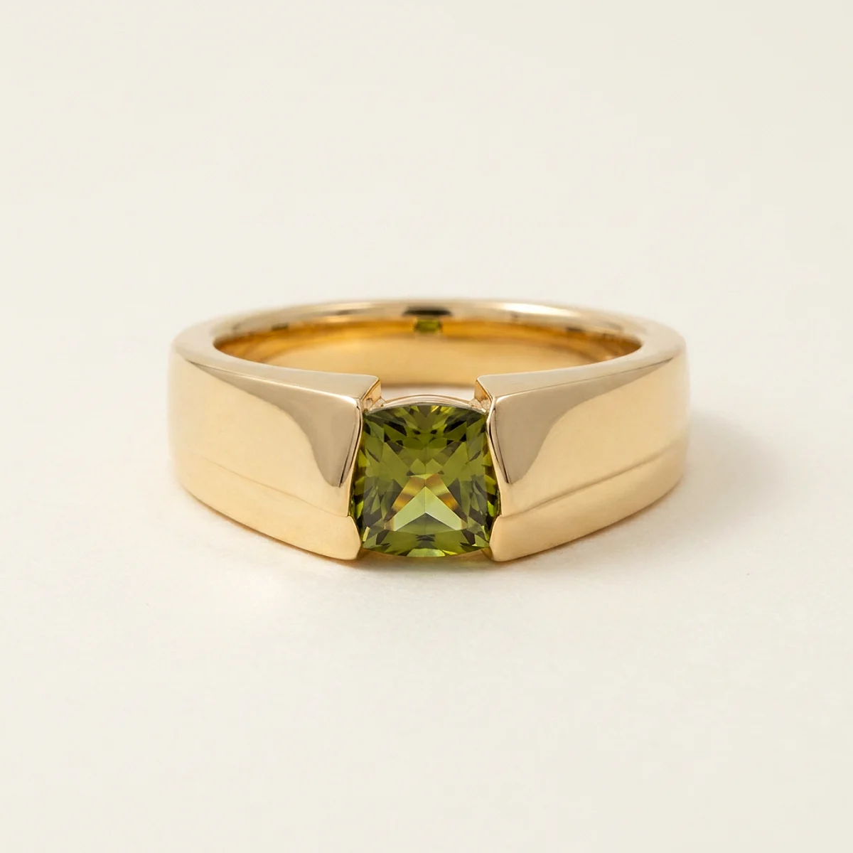 A .5ct green cushion diamond on a yellow gold ring, custom-designed by Eterneva to honor the remarkable Tana.