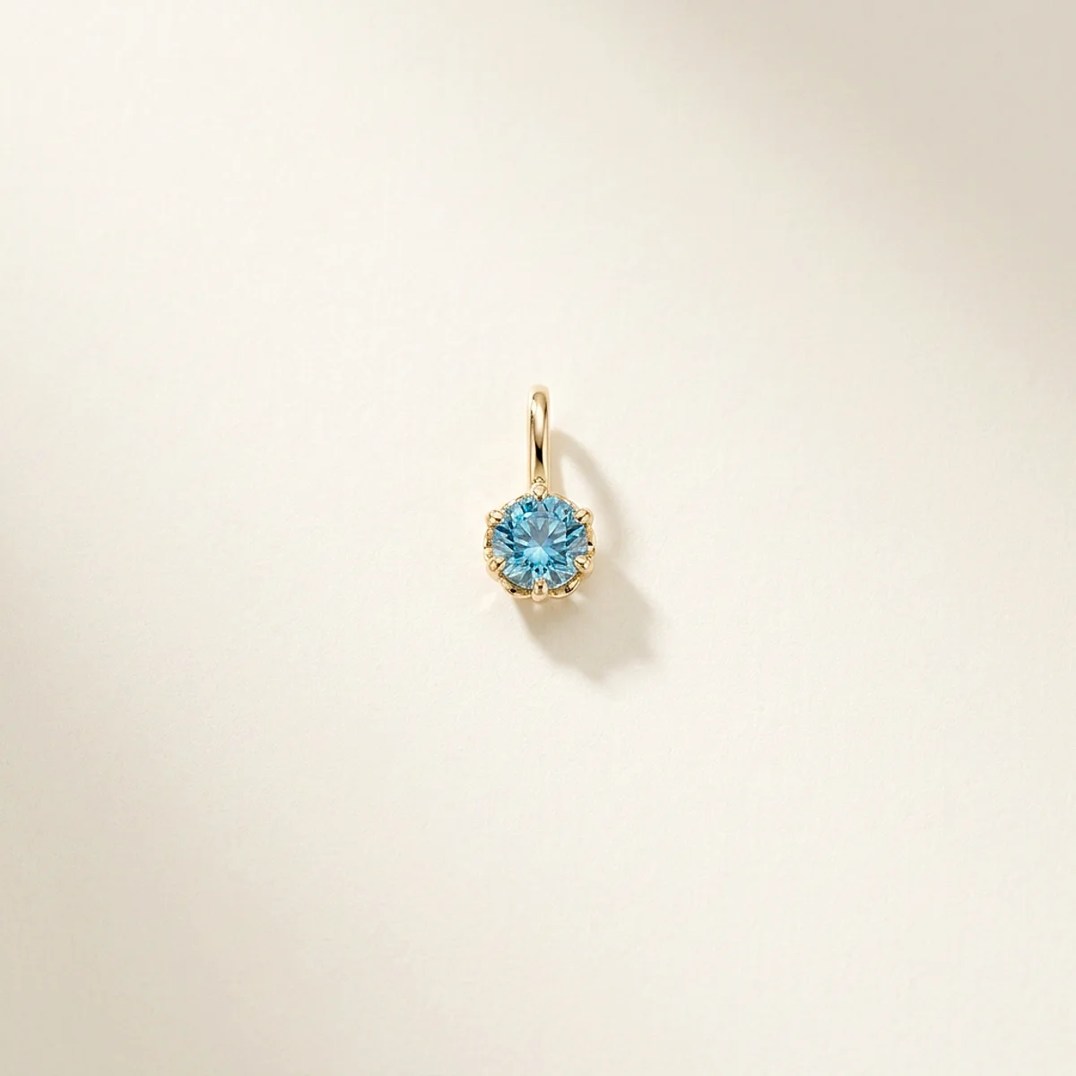 A .4ct blue round diamond on a yellow gold pendant, custom-designed by Eterneva to honor the remarkable Donald.