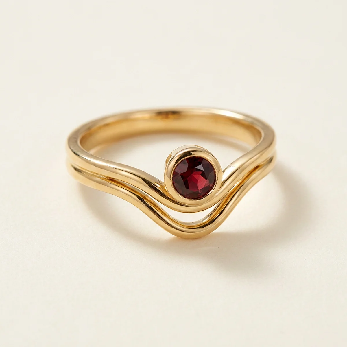 A .25ct red round diamond on a yellow gold ring, custom-designed by Eterneva to honor the remarkable Mark.