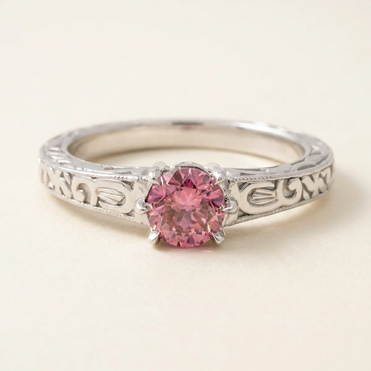 A .5ct pink round diamond on a white gold ring, custom-designed by Eterneva to honor the remarkable Reggie.
