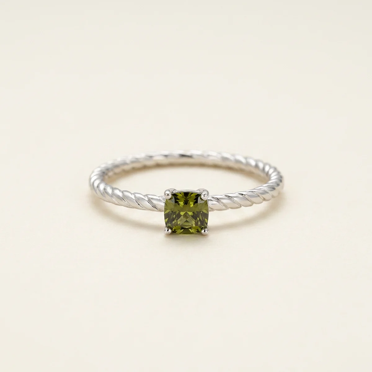 A .4ct green cushion diamond on a yellow gold ring, custom-designed by Eterneva to honor the remarkable Robert.
