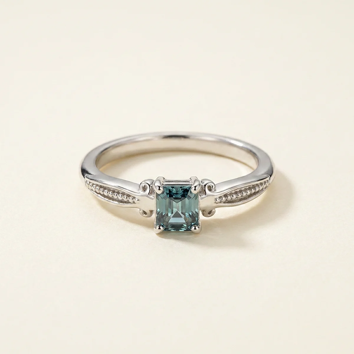 A .4ct blue rectangular radiant diamond on a yellow gold ring, custom-designed by Eterneva to honor the remarkable Robert.