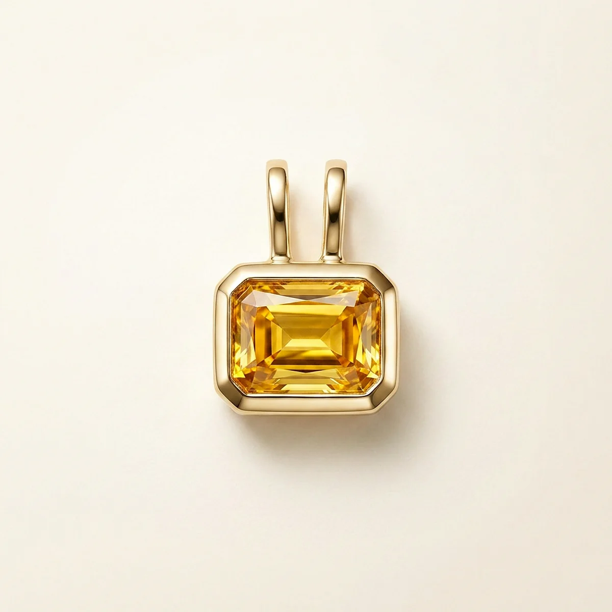 A .25ct amber rectangular radiant diamond on a yellow gold pendant, custom-designed by Eterneva to honor the remarkable Fritz.