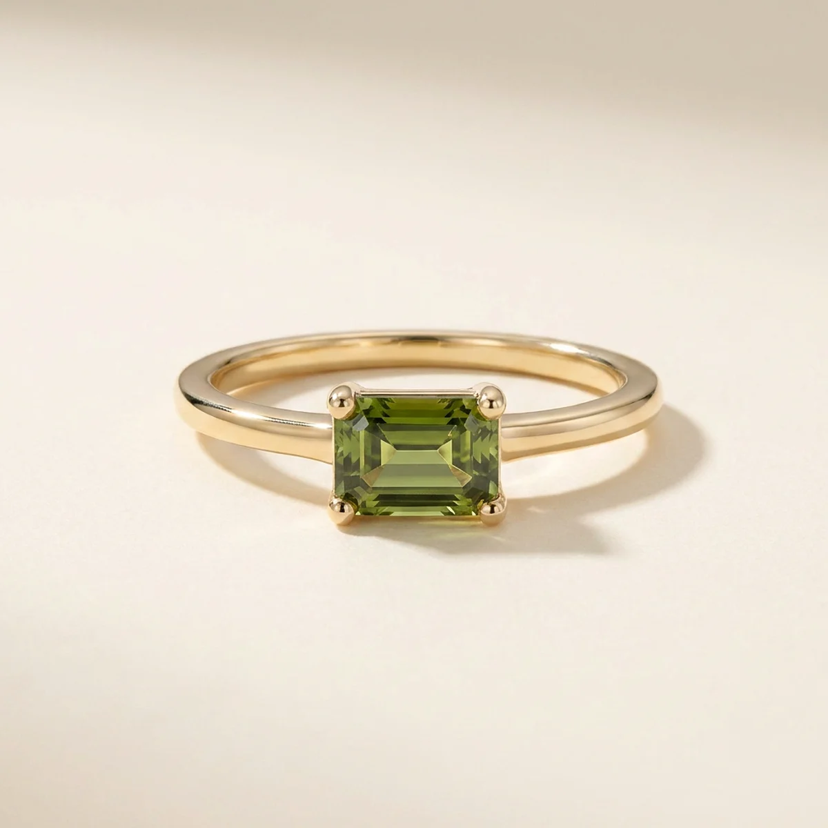 A .5ct green emerald diamond on a yellow gold ring, custom-designed by Eterneva to honor the remarkable Karen.