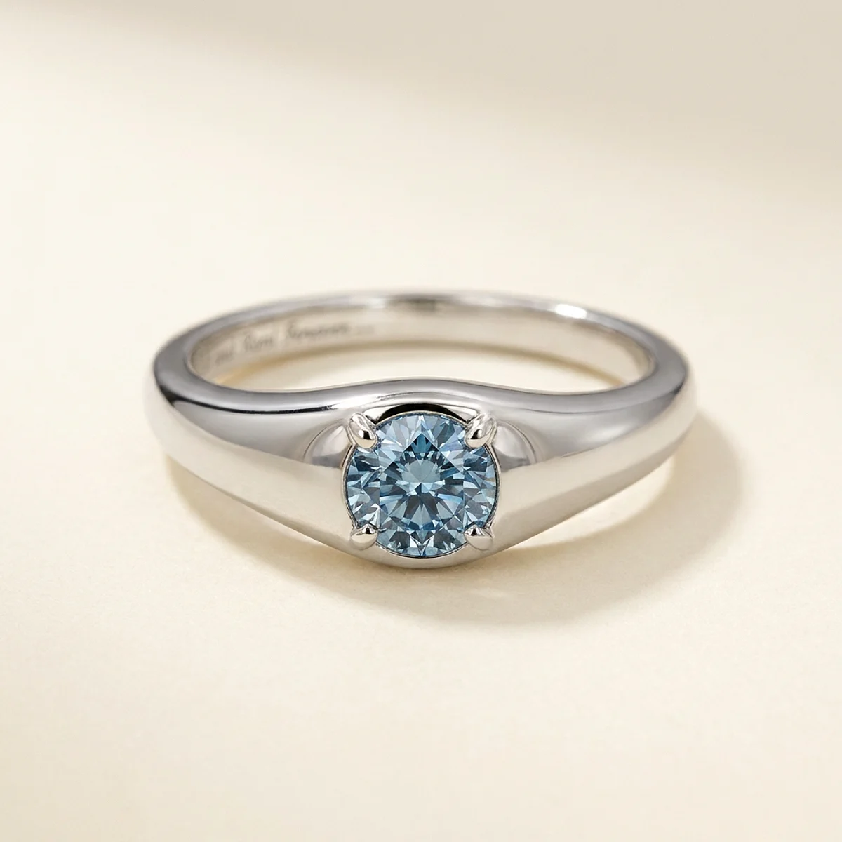 A .5ct blue round diamond on a white gold ring, custom-designed by Eterneva to honor the remarkable Scarlett.