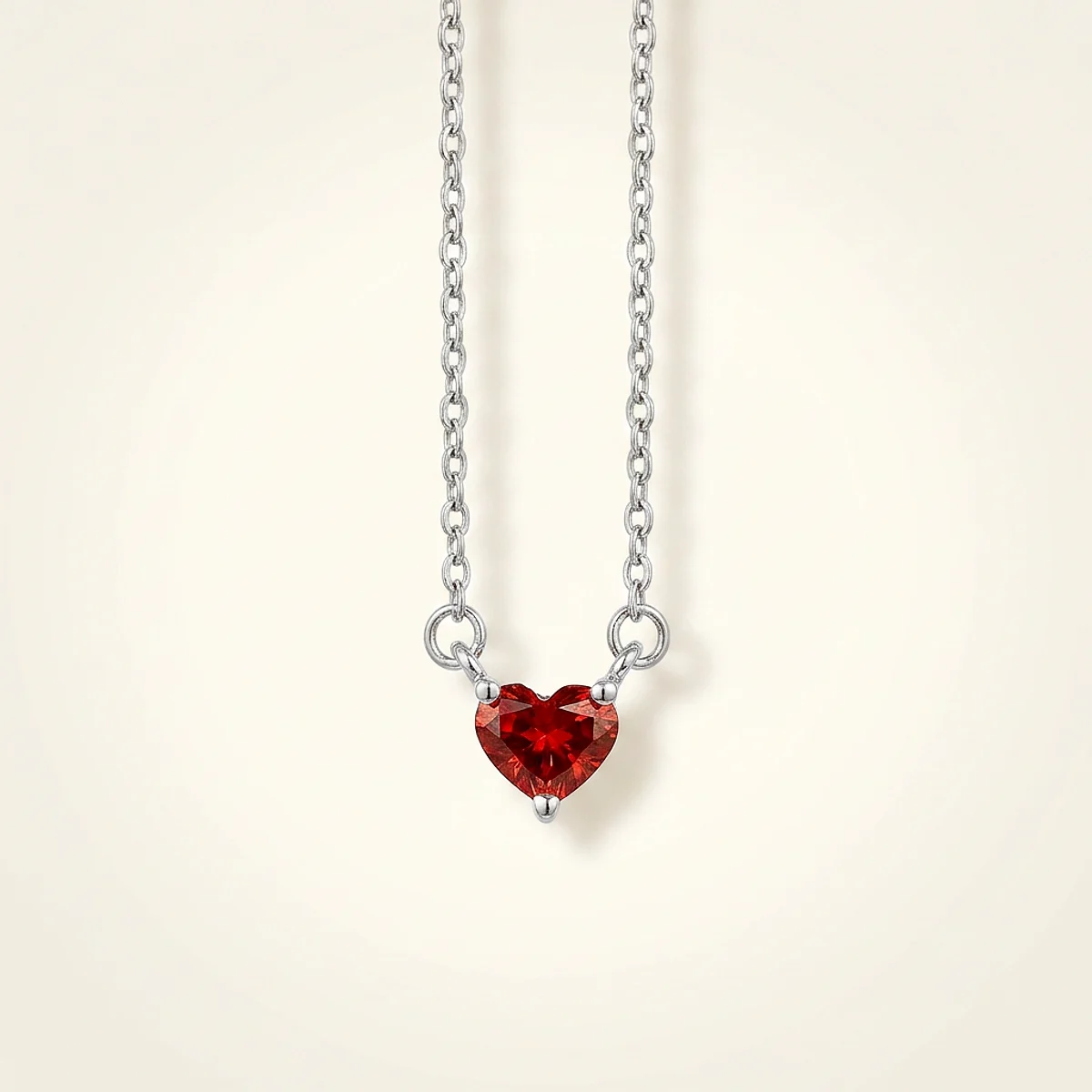 A .4ct red heart diamond on a white gold necklace, custom-designed by Eterneva to honor the remarkable Michael.
