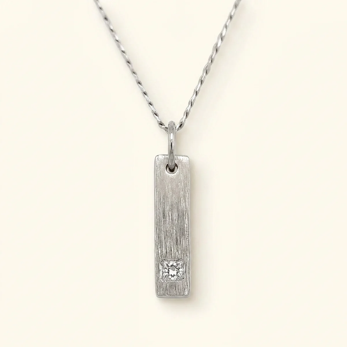 A .15ct colorless asscher diamond on a white gold pendant, custom-designed by Eterneva to honor the remarkable Arnie.