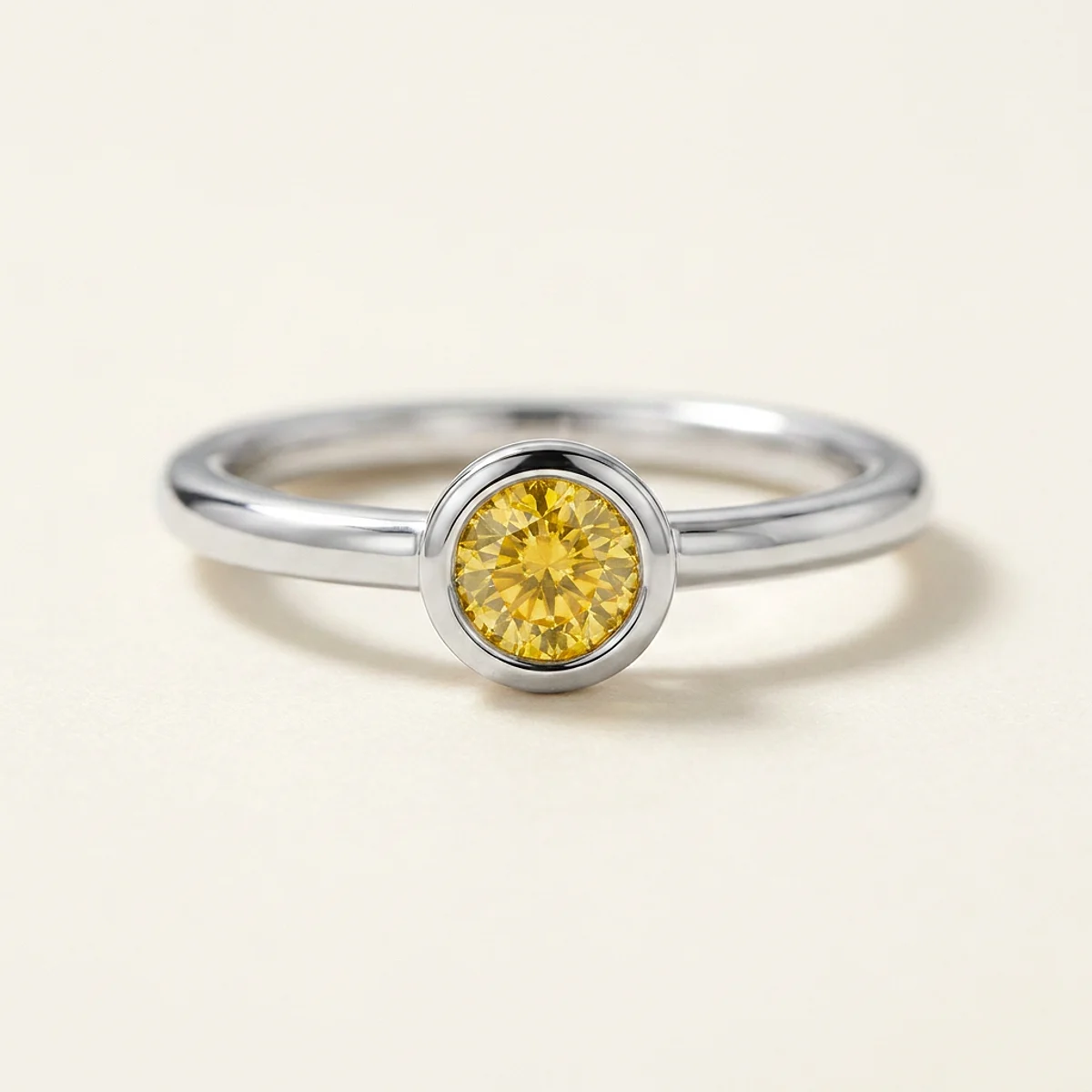A .15ct yellow round diamond on a white gold ring, custom-designed by Eterneva to honor the remarkable Noo.