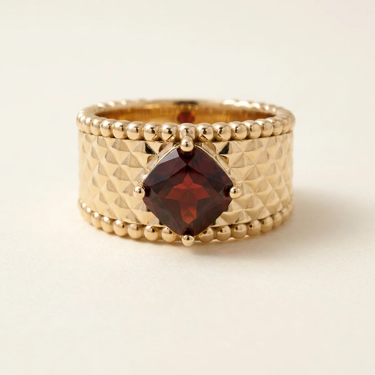 A 2ct red cushion diamond on a yellow gold ring, custom-designed by Eterneva to honor the remarkable Samuel.