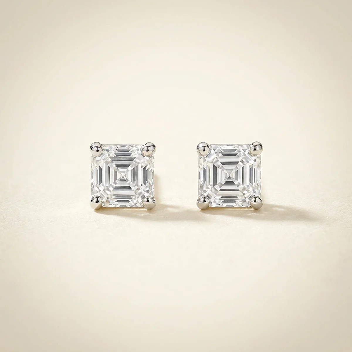 A .25ct colorless asscher diamond on platinum earrings, custom-designed by Eterneva to honor the remarkable Jake.