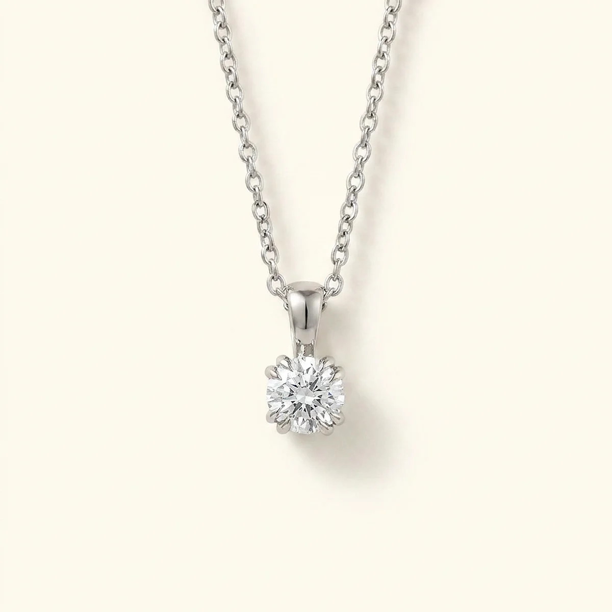A .5ct colorless round diamond on a platinum pendant, custom-designed by Eterneva to honor the remarkable Pamela.