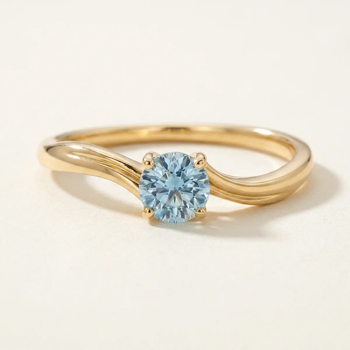 A .25ct blue round diamond on a yellow gold ring, custom-designed by Eterneva to honor the remarkable Joseph.