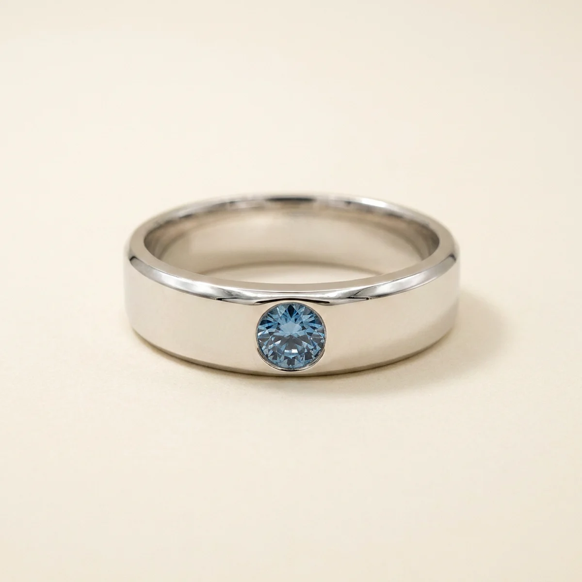 A .25ct blue round diamond on a white gold ring, custom-designed by Eterneva to honor the remarkable Archer.