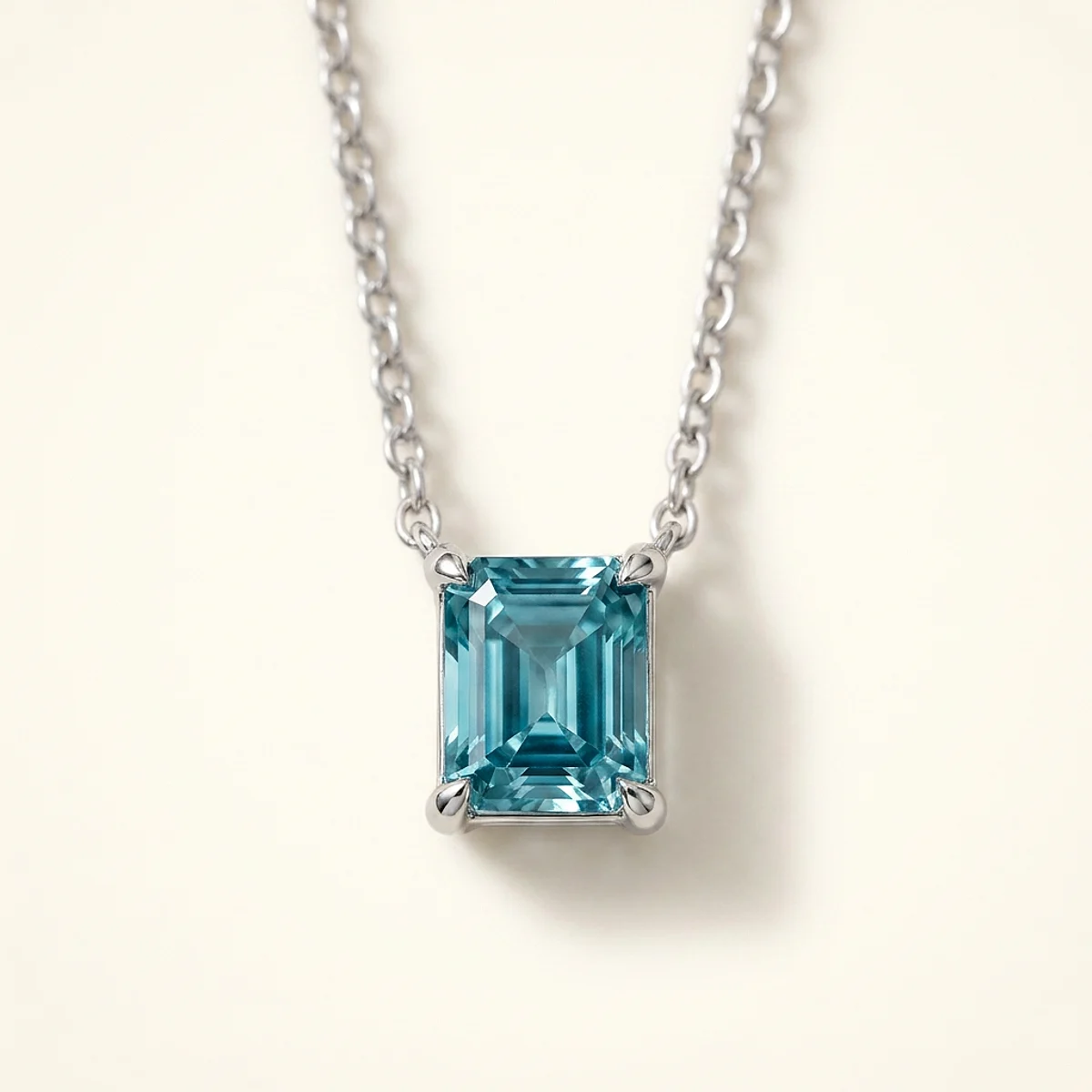 A .5ct blue rectangular radiant diamond on a white gold necklace, custom-designed by Eterneva to honor the remarkable Thomas.