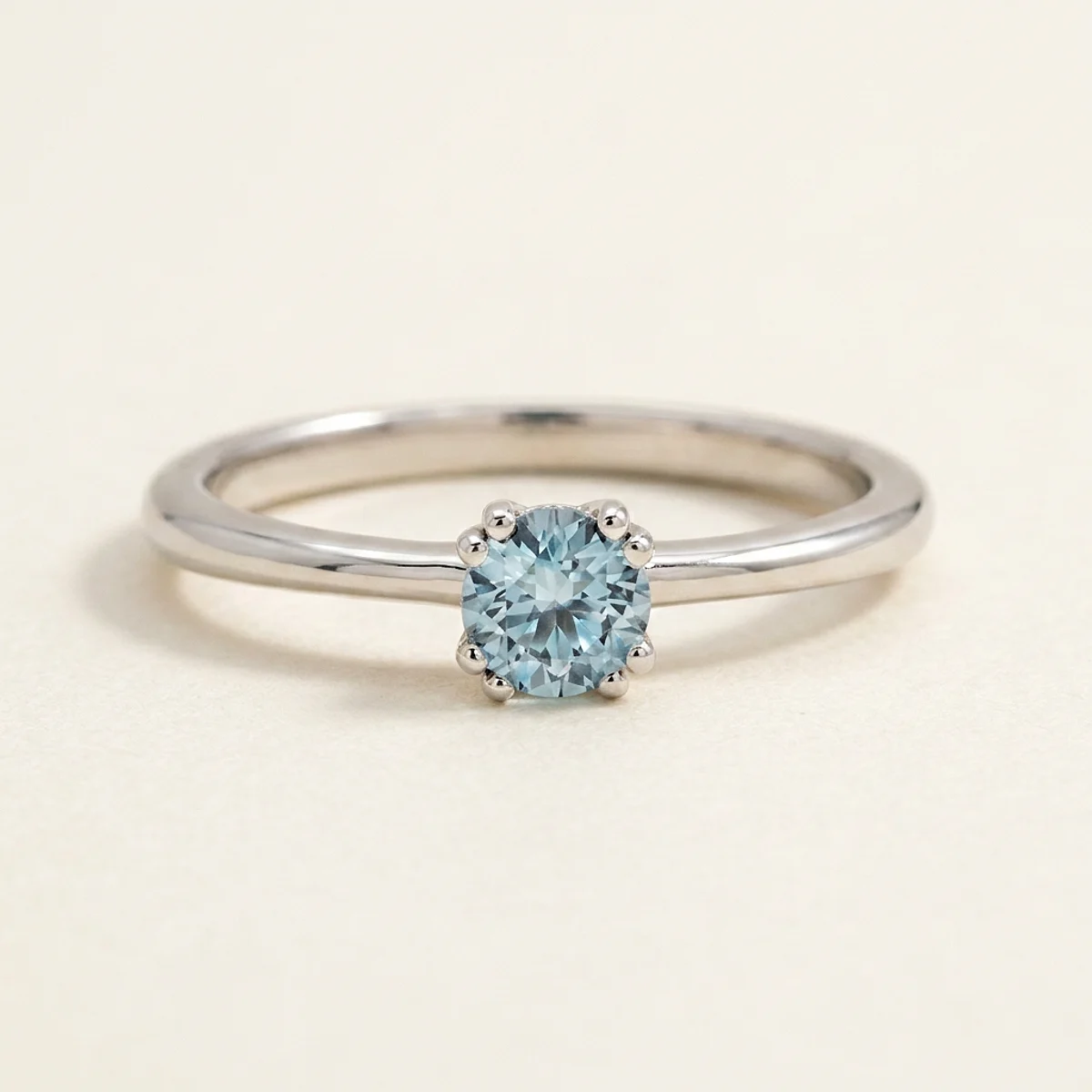 A .4ct blue round diamond on a white gold ring, custom-designed by Eterneva to honor the remarkable Scooter.