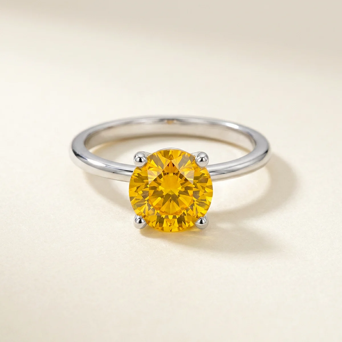 A 1.5ct amber round diamond on a white gold ring, custom-designed by Eterneva to honor the remarkable Amber.