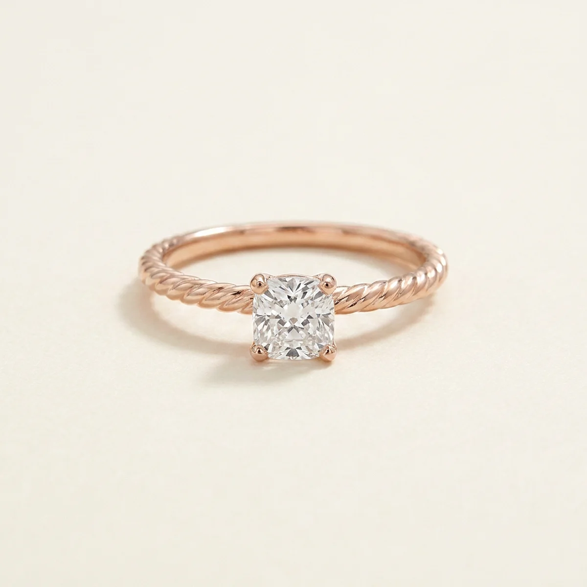 A .5ct colorless cushion diamond on a rose gold ring, custom-designed by Eterneva to honor the remarkable Wendy.