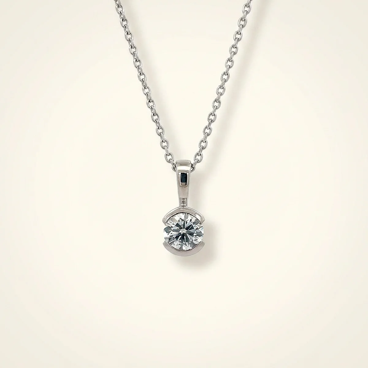 A 1ct colorless round diamond on a platinum pendant, custom-designed by Eterneva to honor the remarkable John.