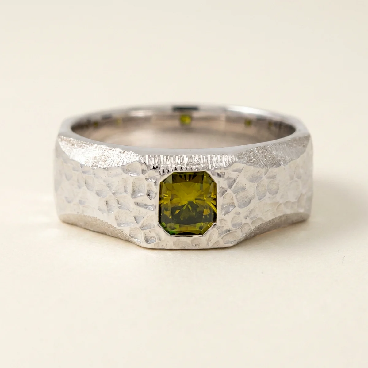 A .75ct green rectangular radiant diamond on a white gold ring, custom-designed by Eterneva to honor the remarkable Natalie.