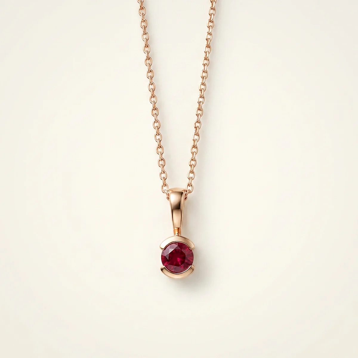 A .4ct red round diamond on a yellow gold pendant, custom-designed by Eterneva to honor the remarkable Doris.
