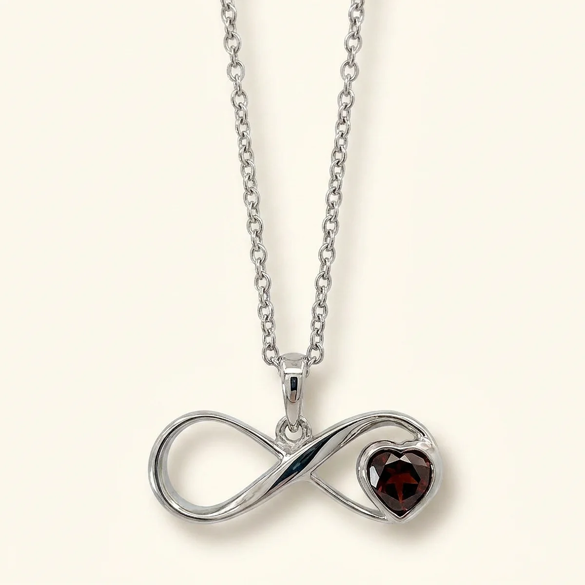 A .5ct red heart diamond on a platinum necklace, custom-designed by Eterneva to honor the remarkable Crystal.