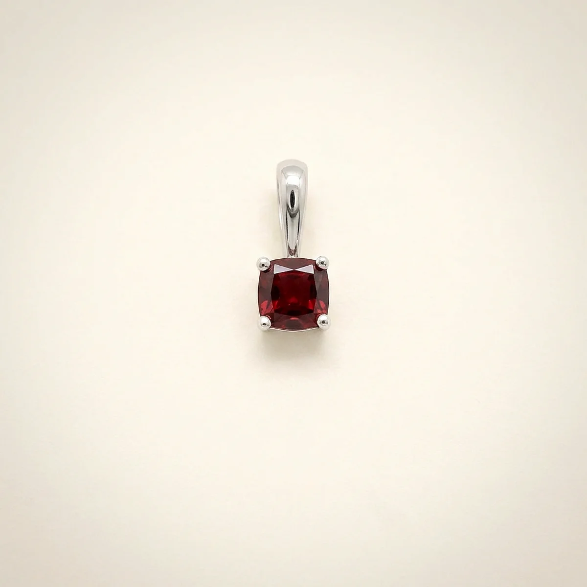 A .75ct red cushion diamond on a white gold pendant, custom-designed by Eterneva to honor the remarkable Kami.