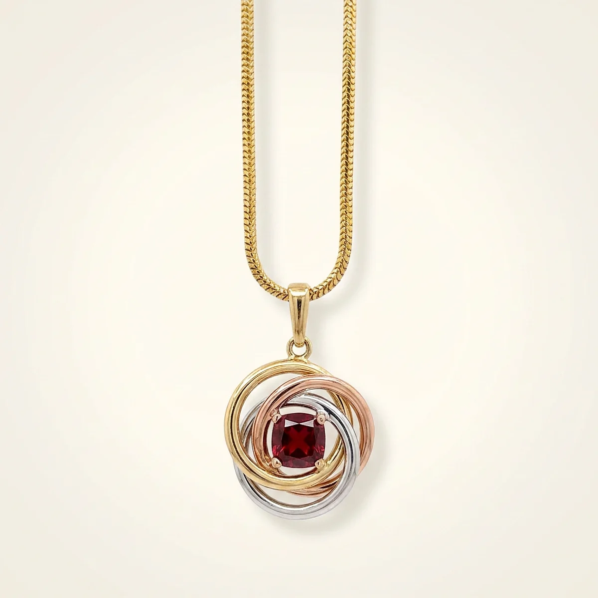 A .5ct red cushion diamond on a mixed metal necklace, custom-designed by Eterneva to honor the remarkable Sharon.