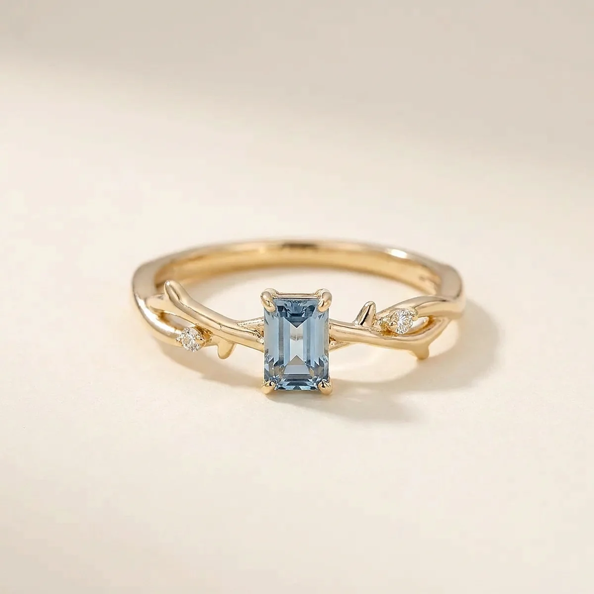 A .5ct blue rectangular radiant diamond on a yellow gold ring, custom-designed by Eterneva to honor the remarkable Peyton.