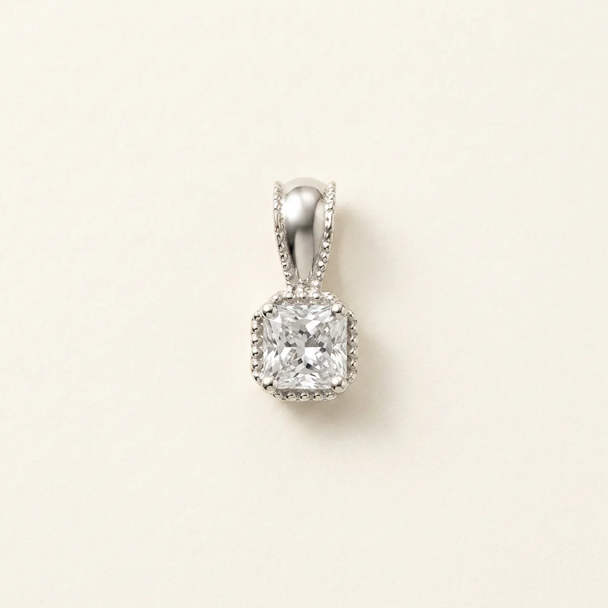 A .5ct colorless square radiant diamond on a platinum pendant, custom-designed by Eterneva to honor the remarkable Jesse.