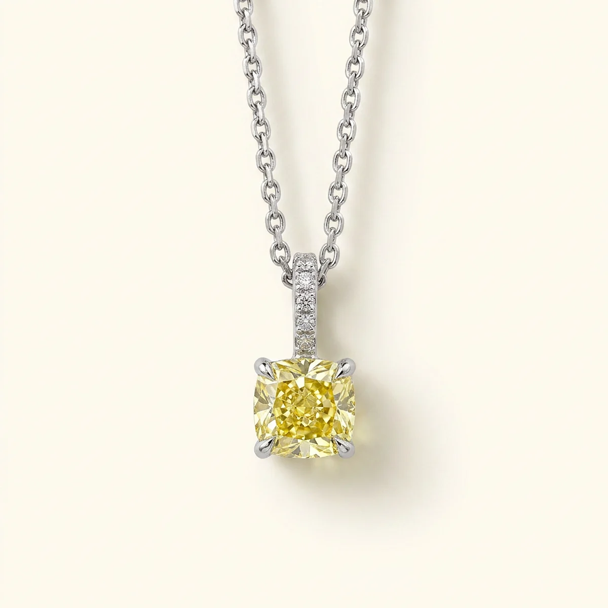 A .4ct yellow cushion diamond on a white gold pendant, custom-designed by Eterneva to honor the remarkable Tony.