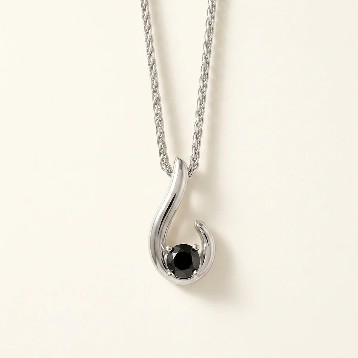 A .4ct black round diamond on a platinum pendant, custom-designed by Eterneva to honor the remarkable Oreo.