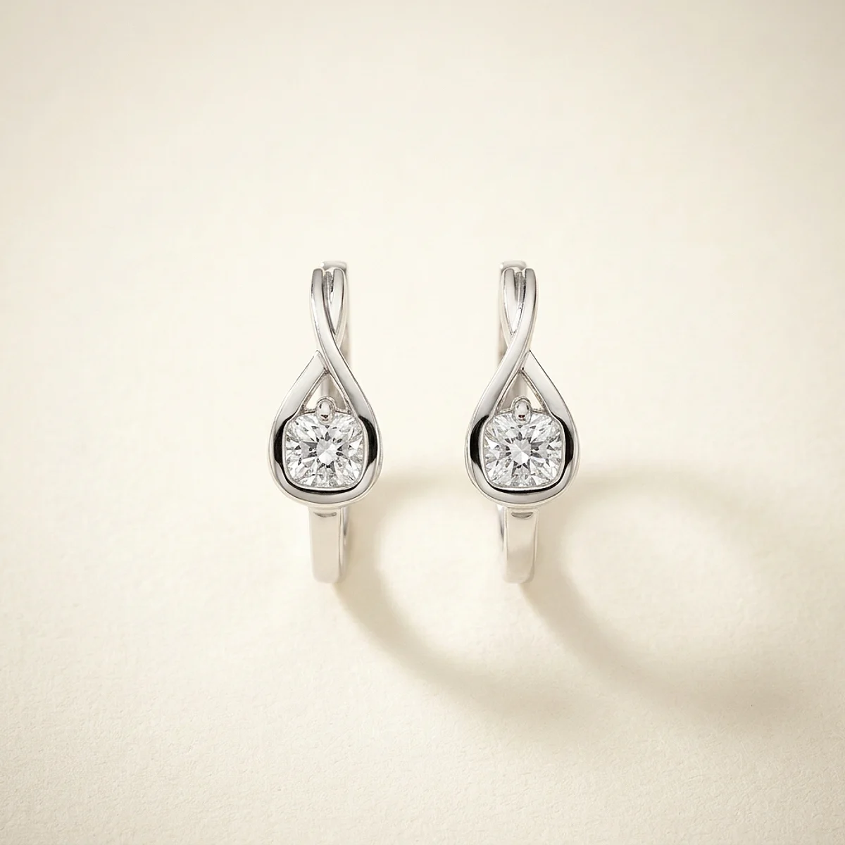 A .25ct colorless cushion diamond on white gold earrings, custom-designed by Eterneva to honor the remarkable Scott.